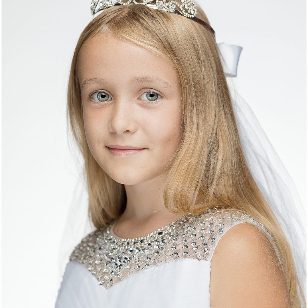 portrait of girl with first communion tiara
