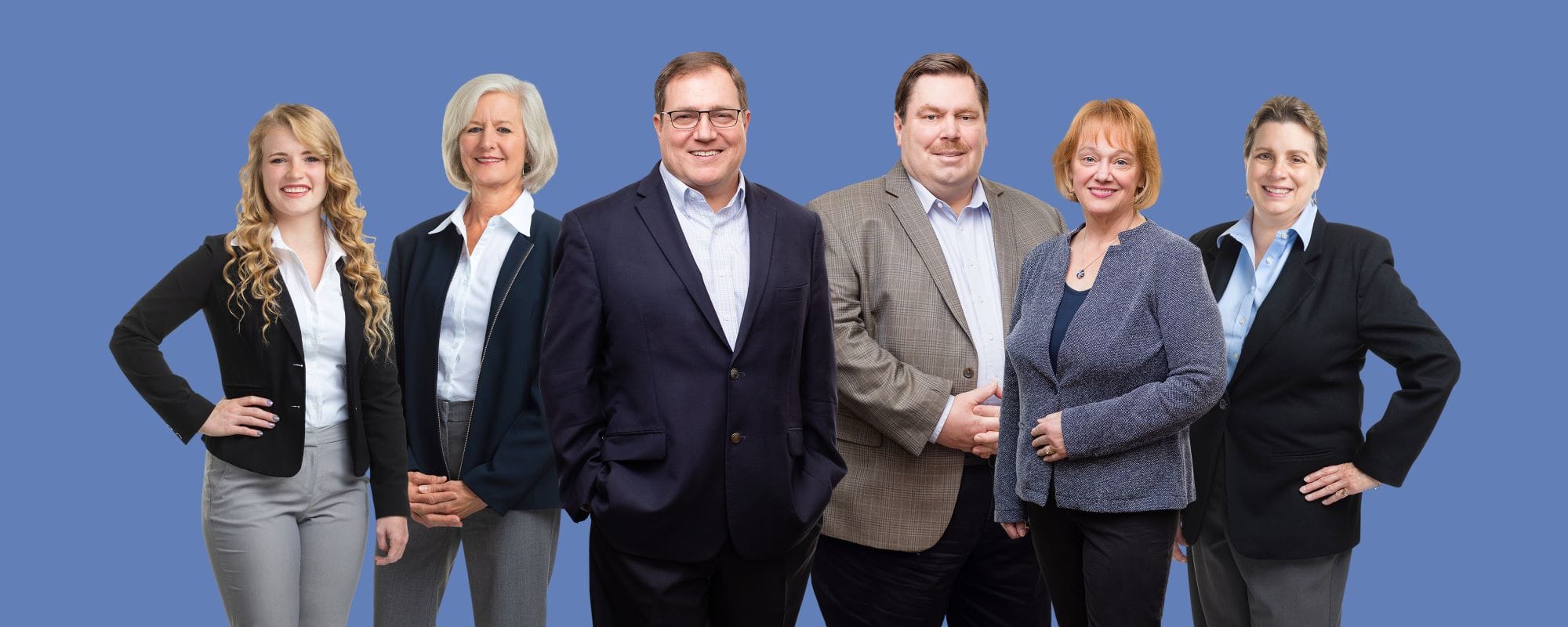 financial advisors team photo on blue background